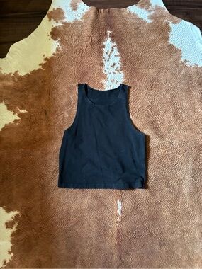 Black cropped tank 
Both tags have been ripped and cut out  
size small